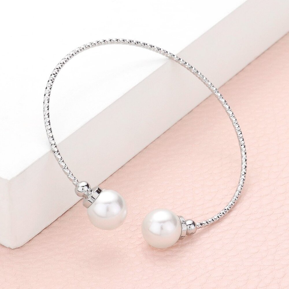 SALE!! A Set of Pearl Tip Cuff Bracelets